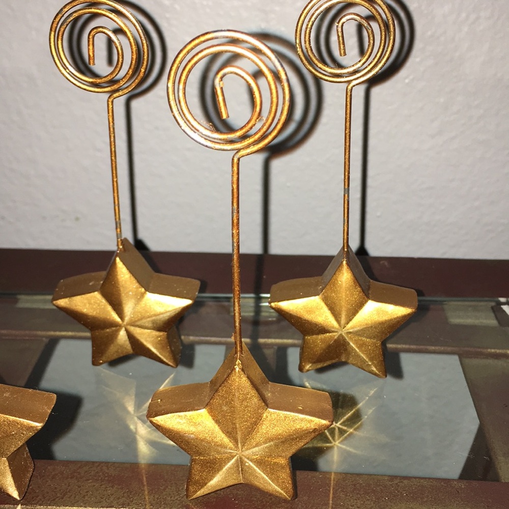 Seven gold stars picture holders or table place holders